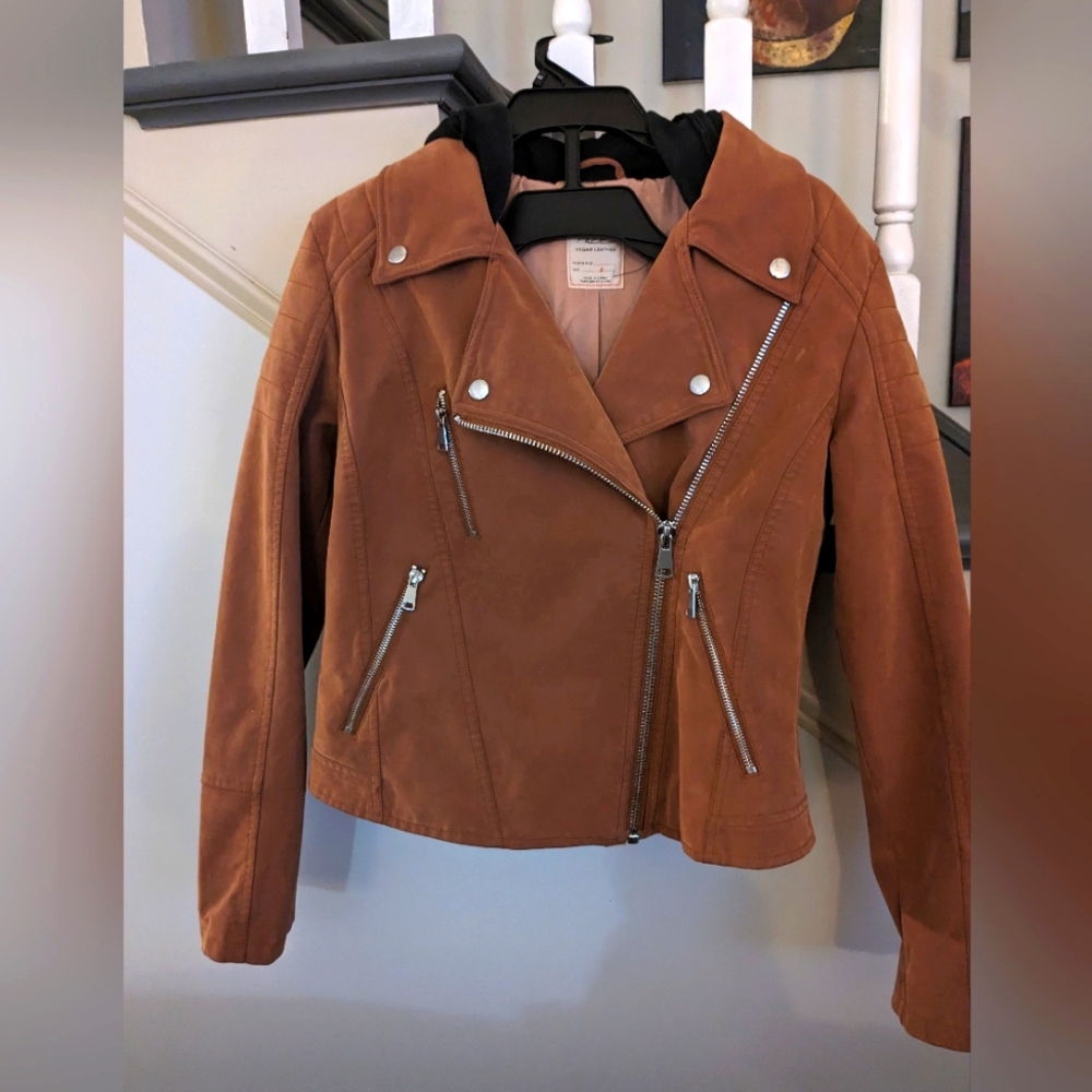 I bought this jacket at Dillard's.... Worn twice...